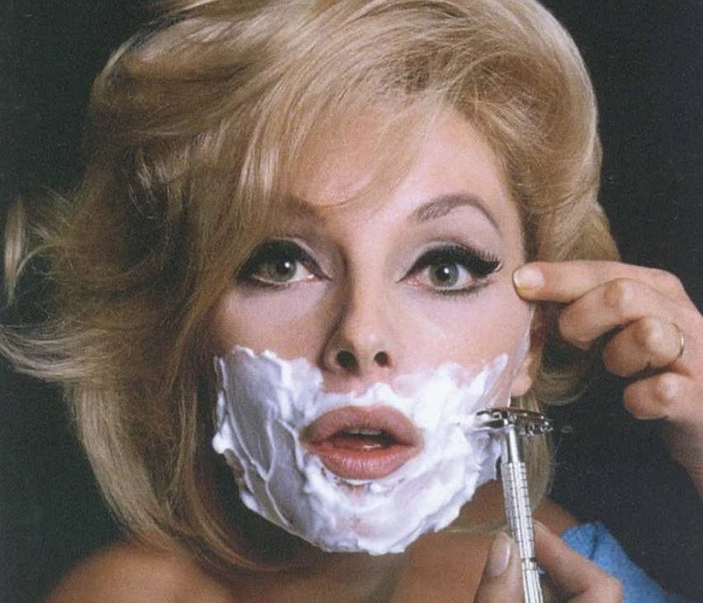 Woman Shaving Face